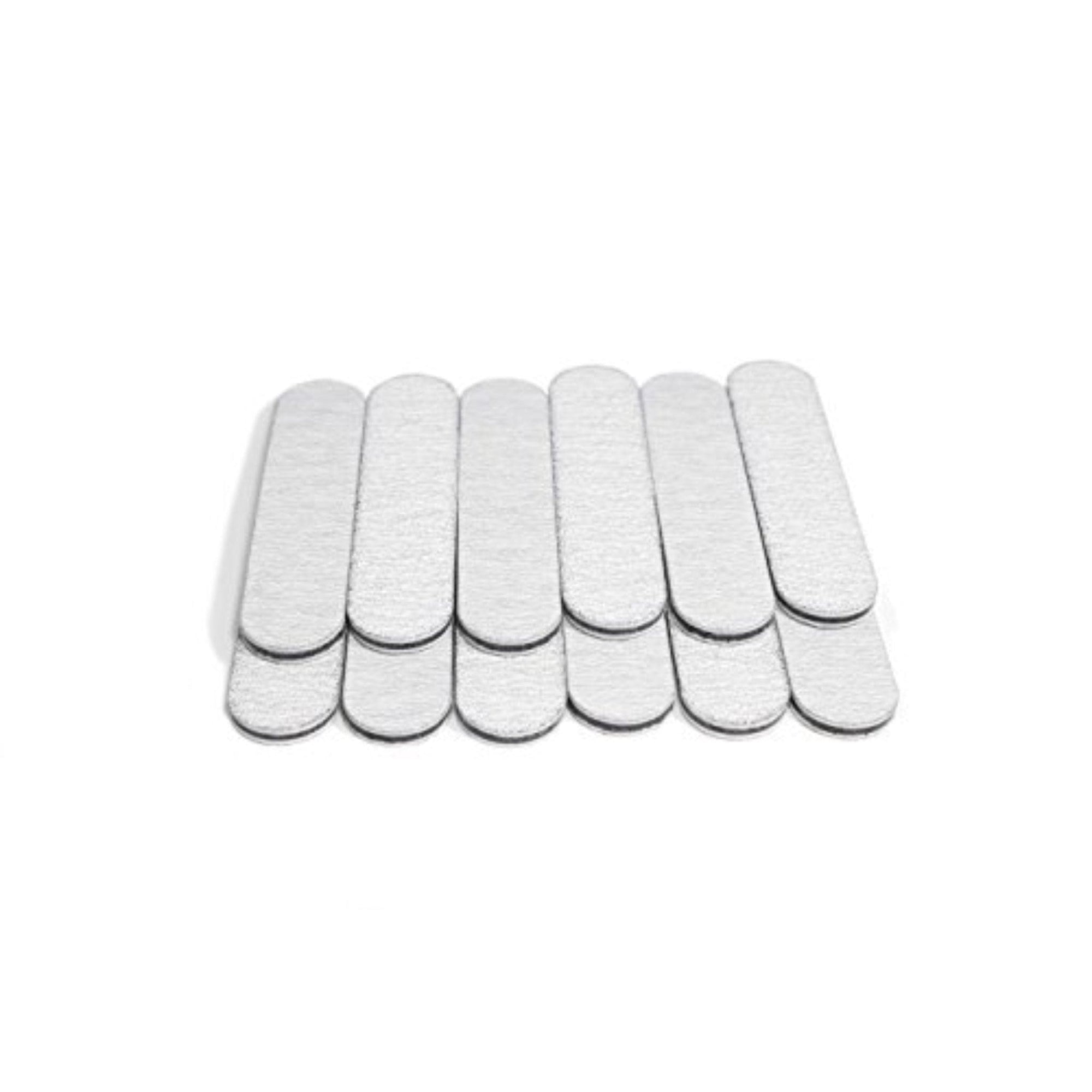 mini Iridesi nail files, black center 3.5 inches long and 3/4 of an inch wide, 12 nail files, 6 stacked on top of 6.