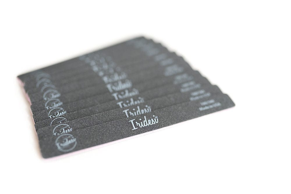 12 nail files partially showing the logo, Iridesi brand name and grit. Most of the writing on the file is blurred