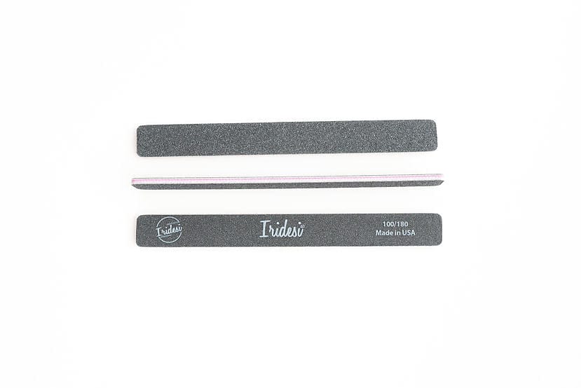 3 Iridesi black square end nail files, showing the front, side and back of the file. There is printing on the front of the nail file, Iridesi logo, name, grit and the text "made in USA".
