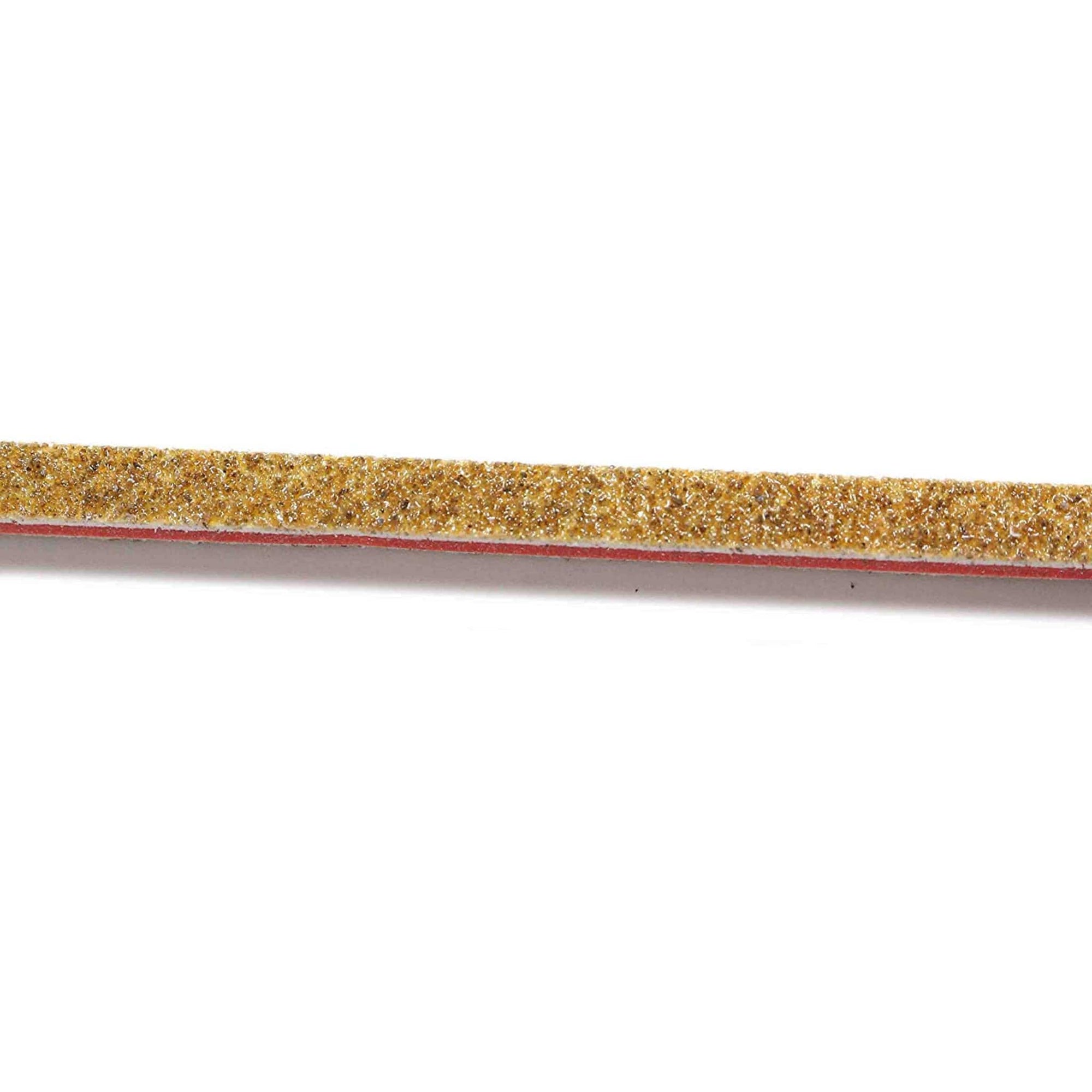 close up of a brown 80 grit twig or stick that has a red center plastic.