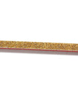 close up of a brown 80 grit twig or stick that has a red center plastic.