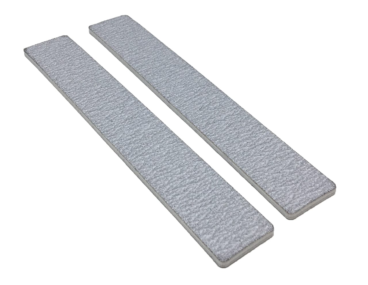 Two jumb zebra nail files, white center, white background