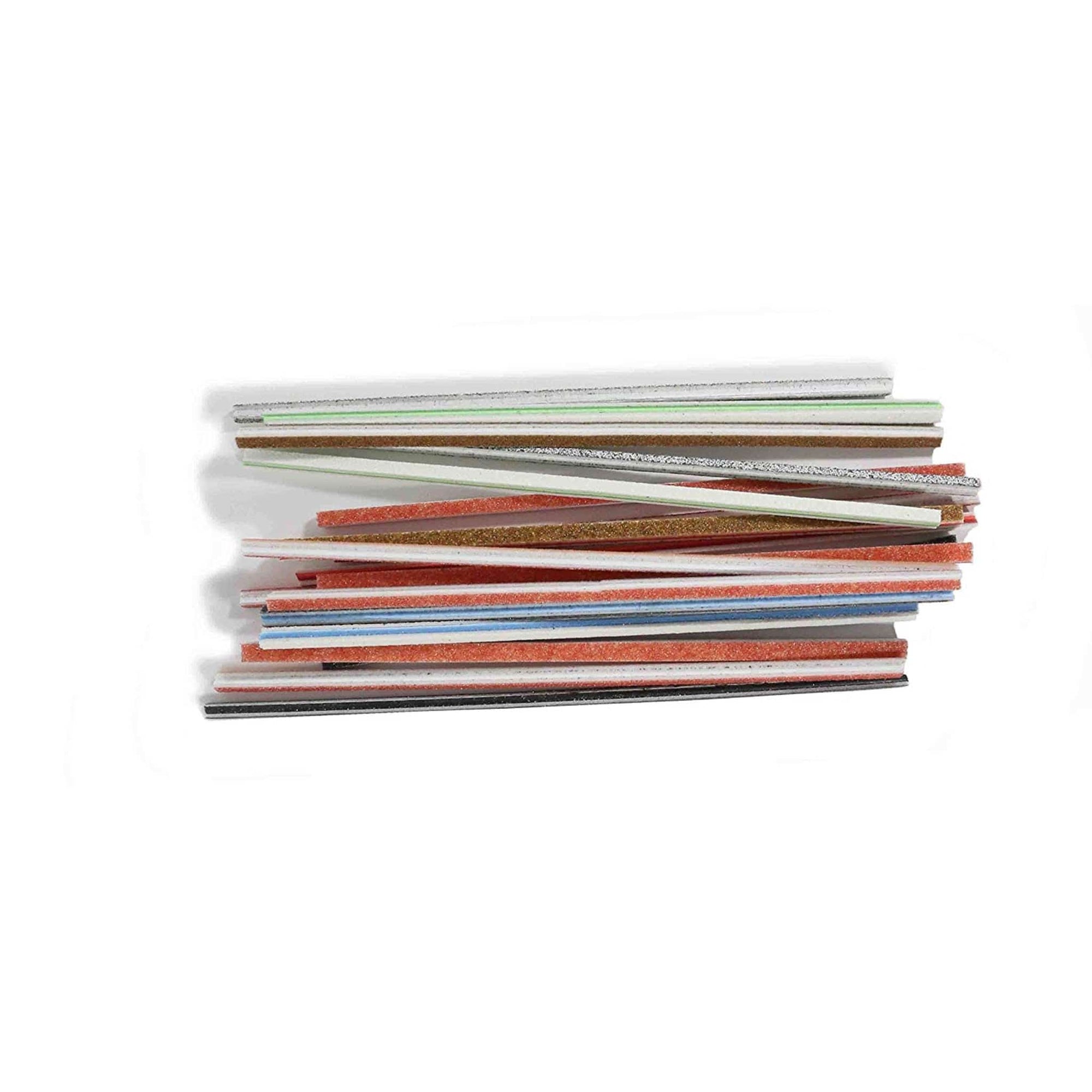 a stack of sanding twigs laying horizontally on a white background