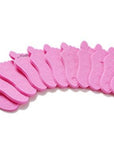 Teenie toe separators 12 pack. Pink toe separators in the shape of a baby foot. White background