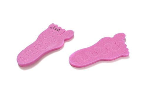 Teenie toe separators. Pink toe separators in the shape of a baby foot. White background. close up of foot print steps.