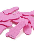 Teenie toe separators. Pink toe separators in the shape of a baby foot. White background