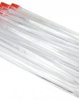 24 cuticle pushers stacked up on a white surface. The tips are red and the body is clear plastic.