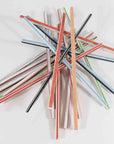 a bunch of twigs mixed up on the table showing many colored centers and sandpaper.