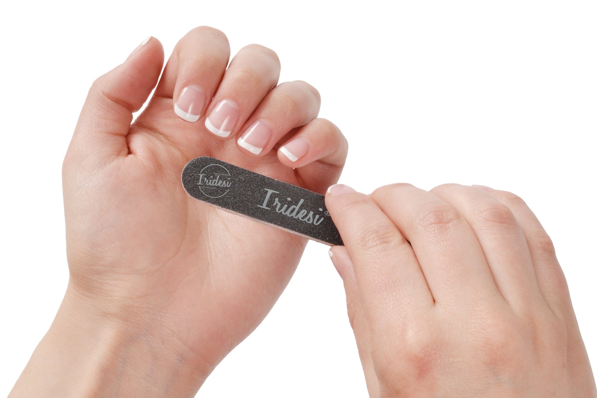 mini black nail files 100/180 grit, white background, white plastic center. women holding one nail file with French manicure.