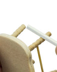 sanding sticks or twigs being used on a mini wooden chair